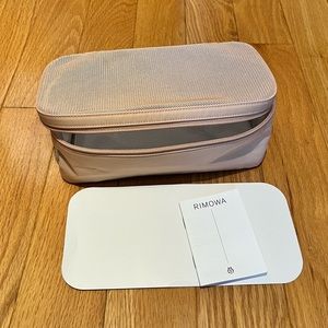 New rimowa travel packing cube pouch with tags